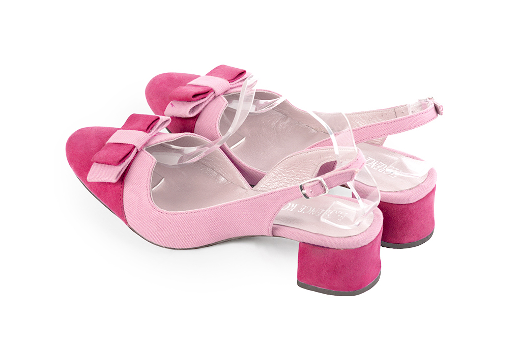 Fuschia pink women's open back shoes, with a knot. Round toe. Low flare heels. Rear view - Florence KOOIJMAN